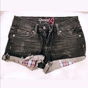Distressed denim shorts